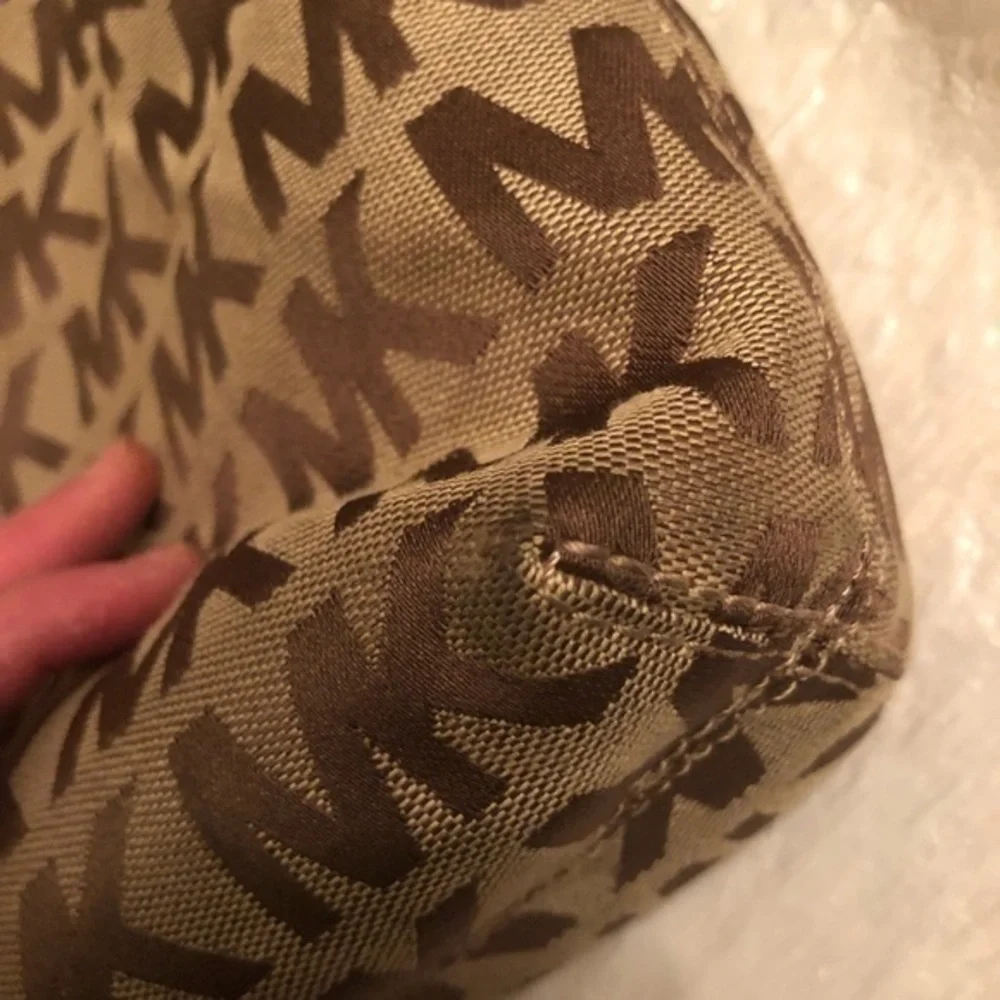 Michael kors brown monogram tote bag with blue leather trim
